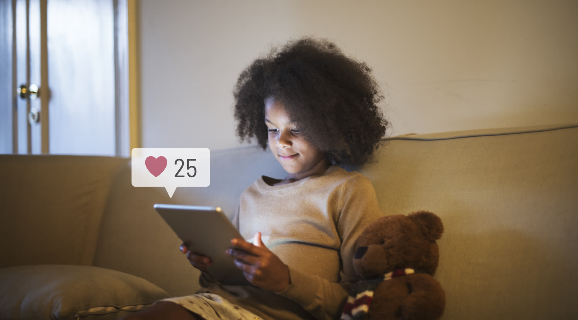 A child using a tablet at home
