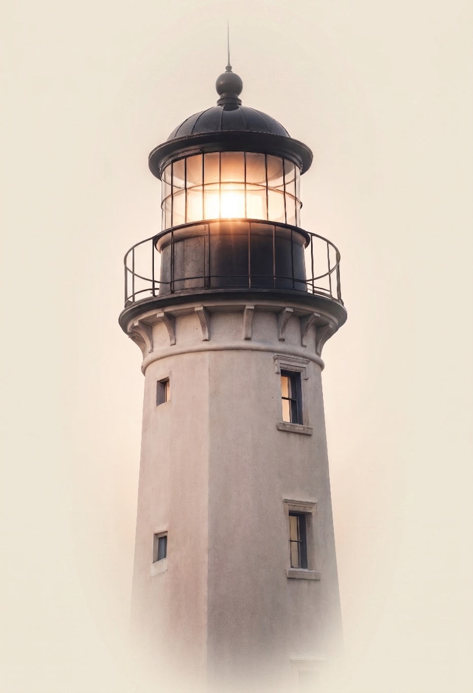 A lighthouse, lit, standing watch
